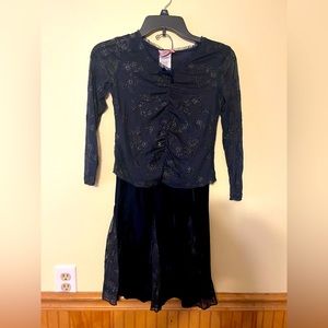 Girls size 10, 2-pc dress set. Velour skirt w/polyester long-sleeve top. Navy